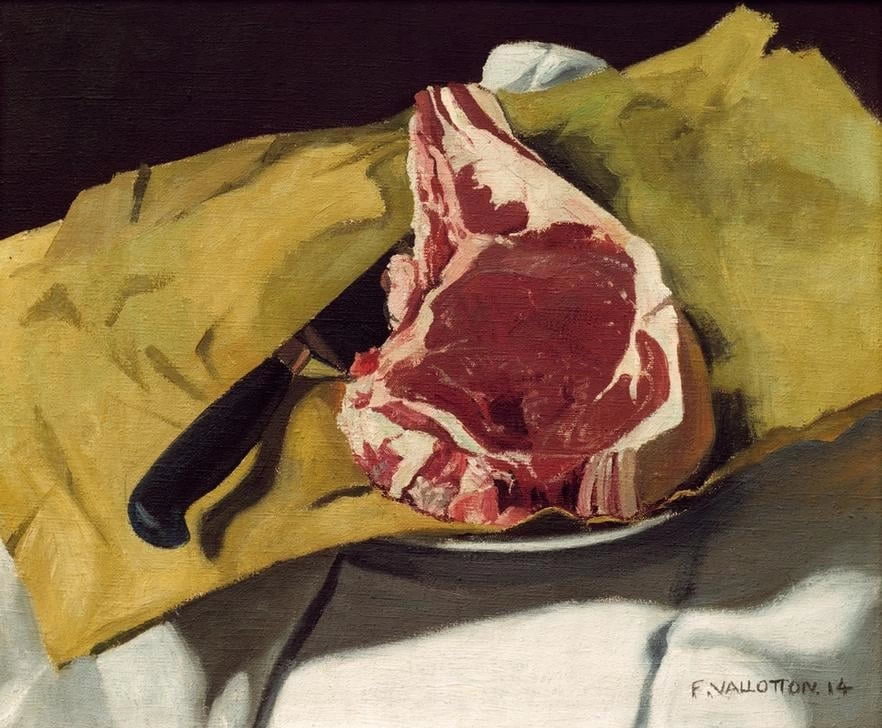 Una bistecca su un foglio giallo
